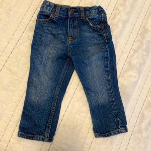 Osh Kosh B’gosh blue jeans. 18M